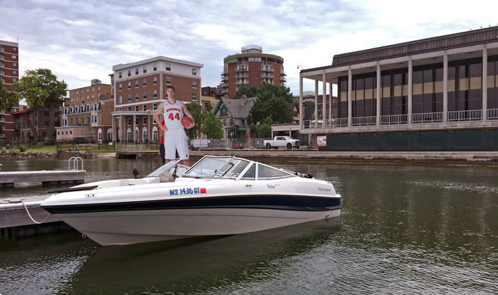 Cut-out of Frank Kaminsky on a boat.