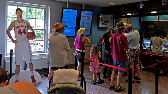 Cut-out of Frank Kaminsky orders ice cream.