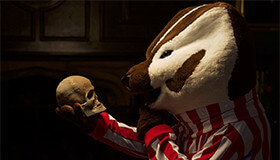 Bucky holding a skull.