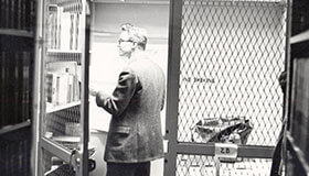 Black and white photo of Memorial Library study cages.