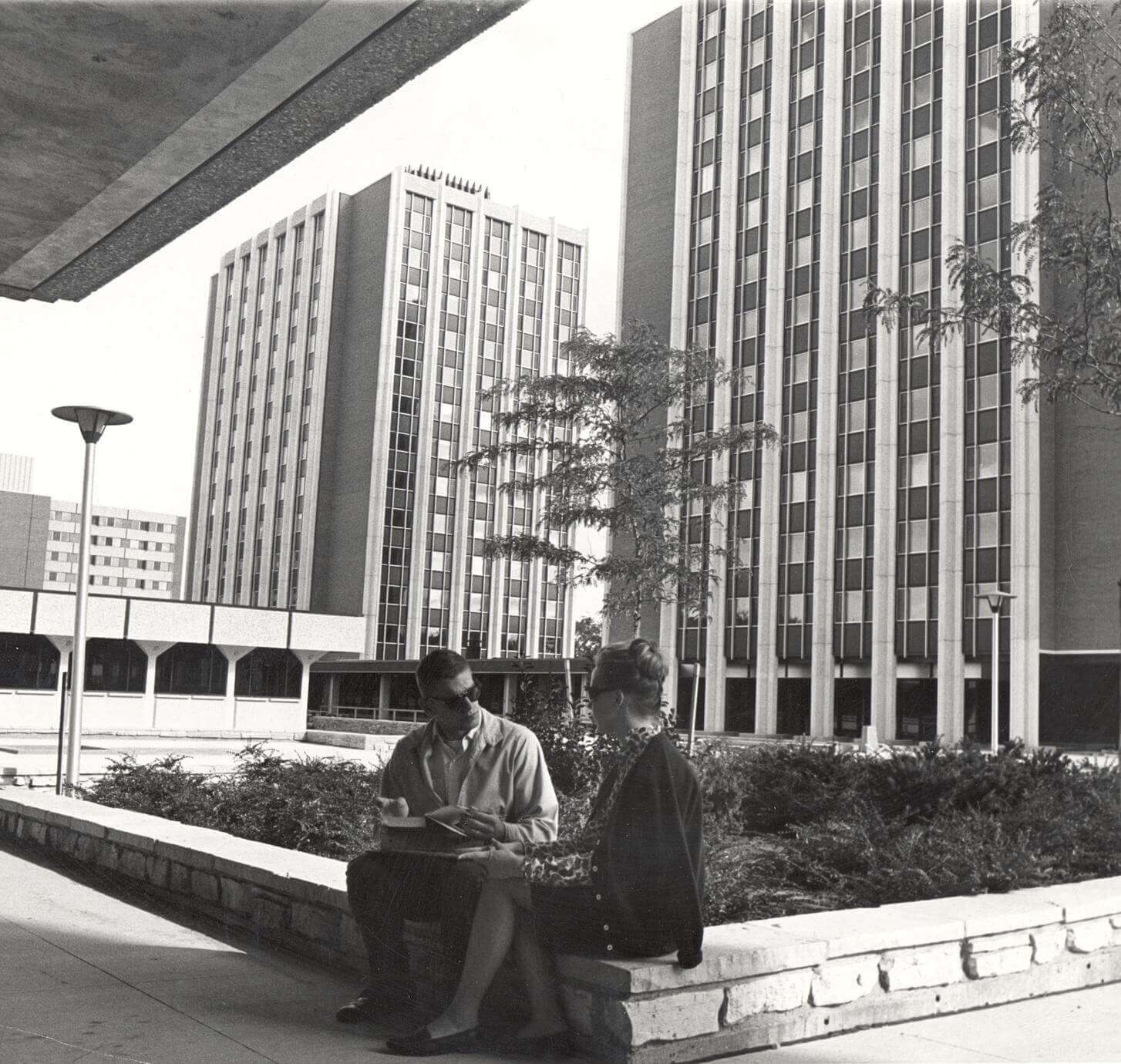 Students sitting in a courtyard