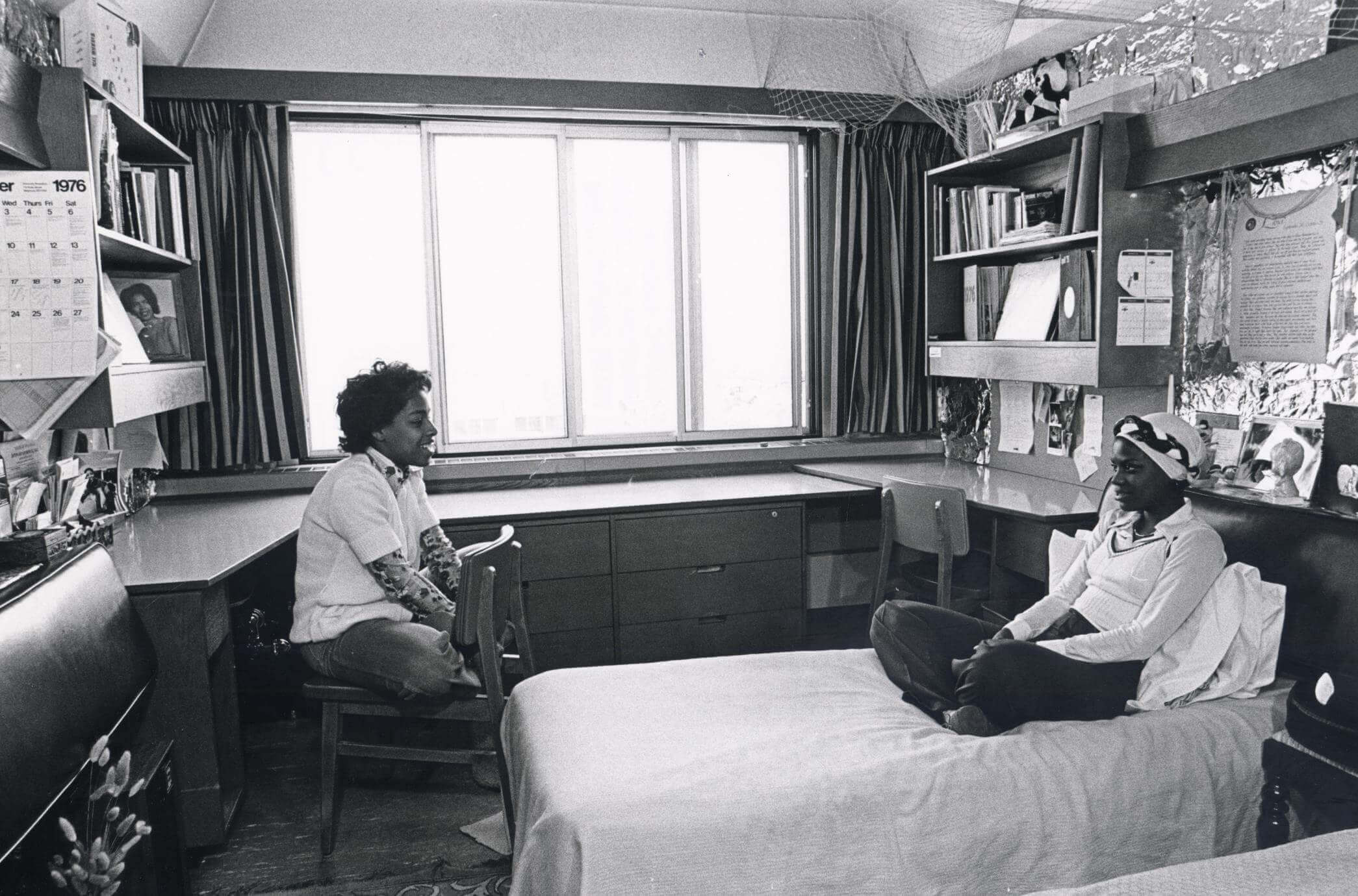 Students talking in their dorm room