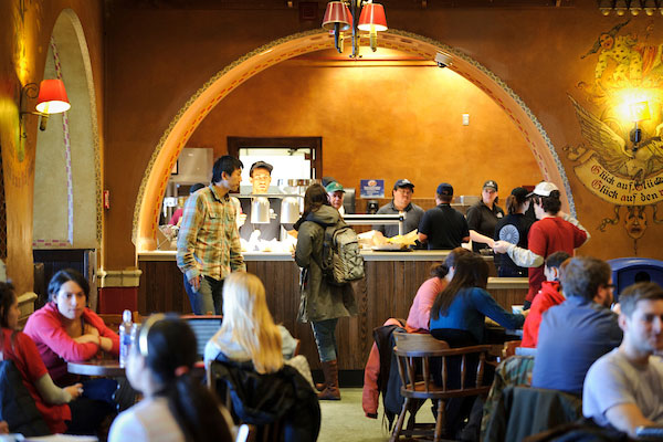 ON JAN. 24, 2012, PATRONS COLLECT THEIR MADE-TO-ORDER FOOD FROM A PICKUP COUNTER AT THE NEWLY RENOVATED DER RATHSKELLER IN THE MEMORIAL UNION. (PHOTO BY JEFF MILLER / UNIVERSITY COMMUNICATIONS)