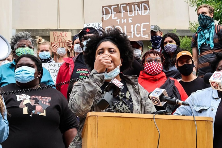Bianca Gomez speaking at a protest