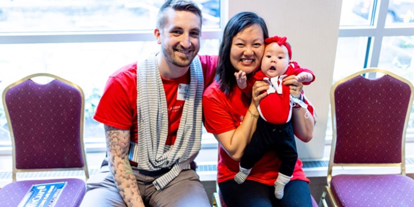 Two parents with their baby