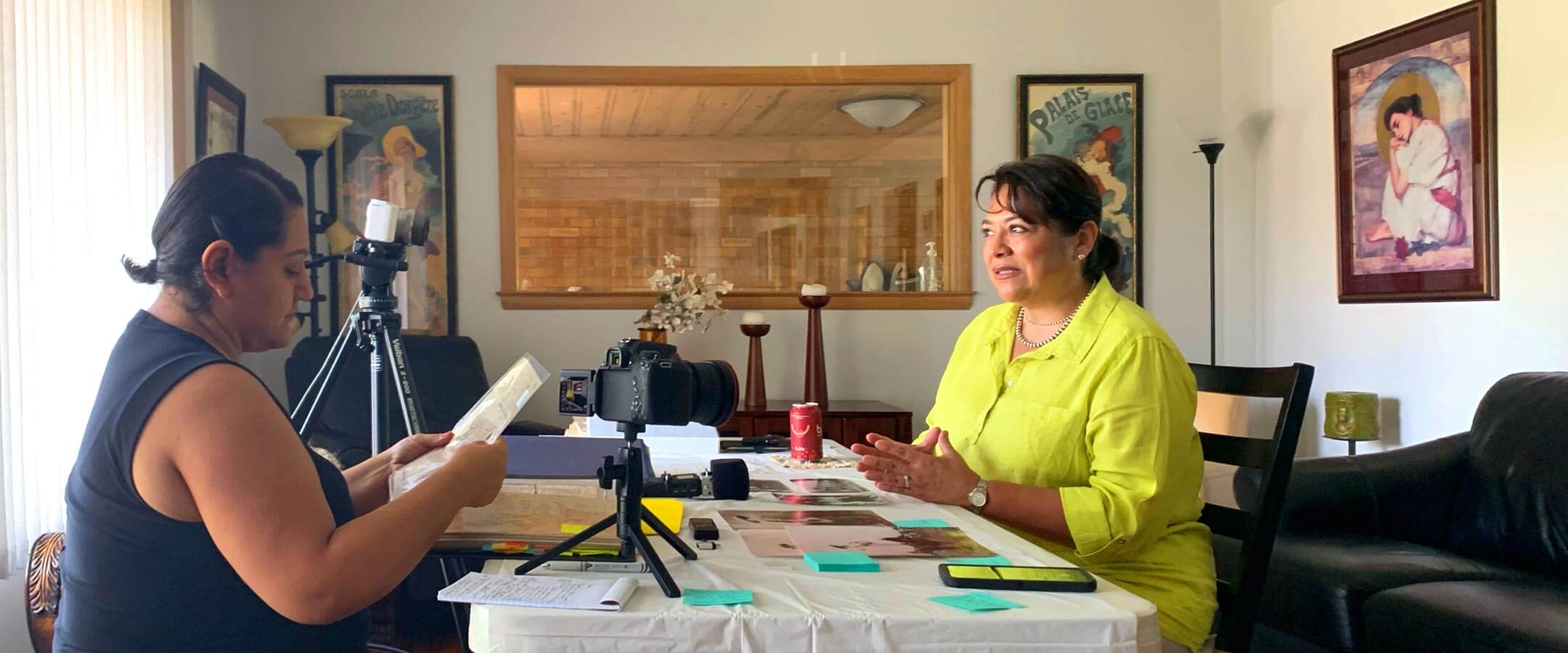 Women organizing archival materials for Wisconsin Latinx History Collective.