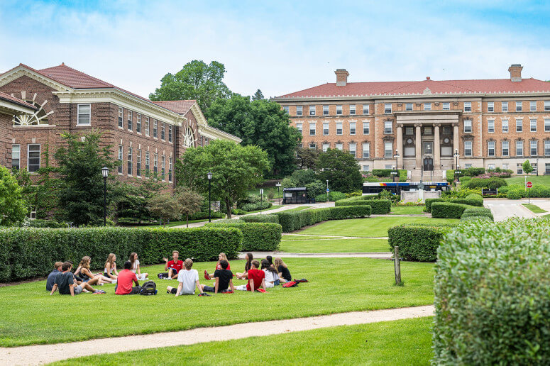 Students sitting on Bascom Hill.