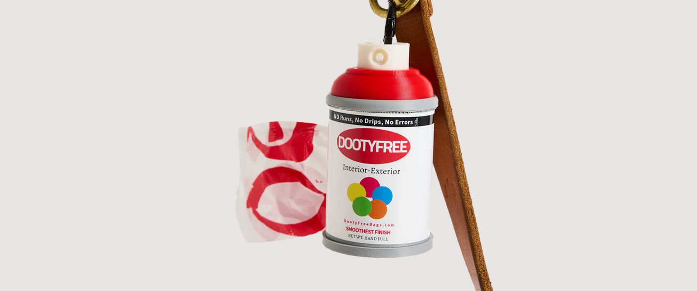 A waste bag dispenser shaped like a can of spray paint.