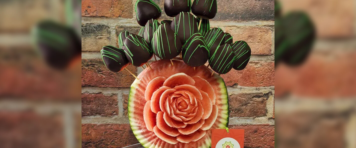 A rose design carved into a melon.