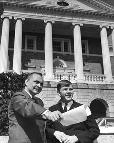 Assistant Chancellor James W. Cleary PhD'56 with Meyst at the beginning of their tour, in front of Bascom Hall